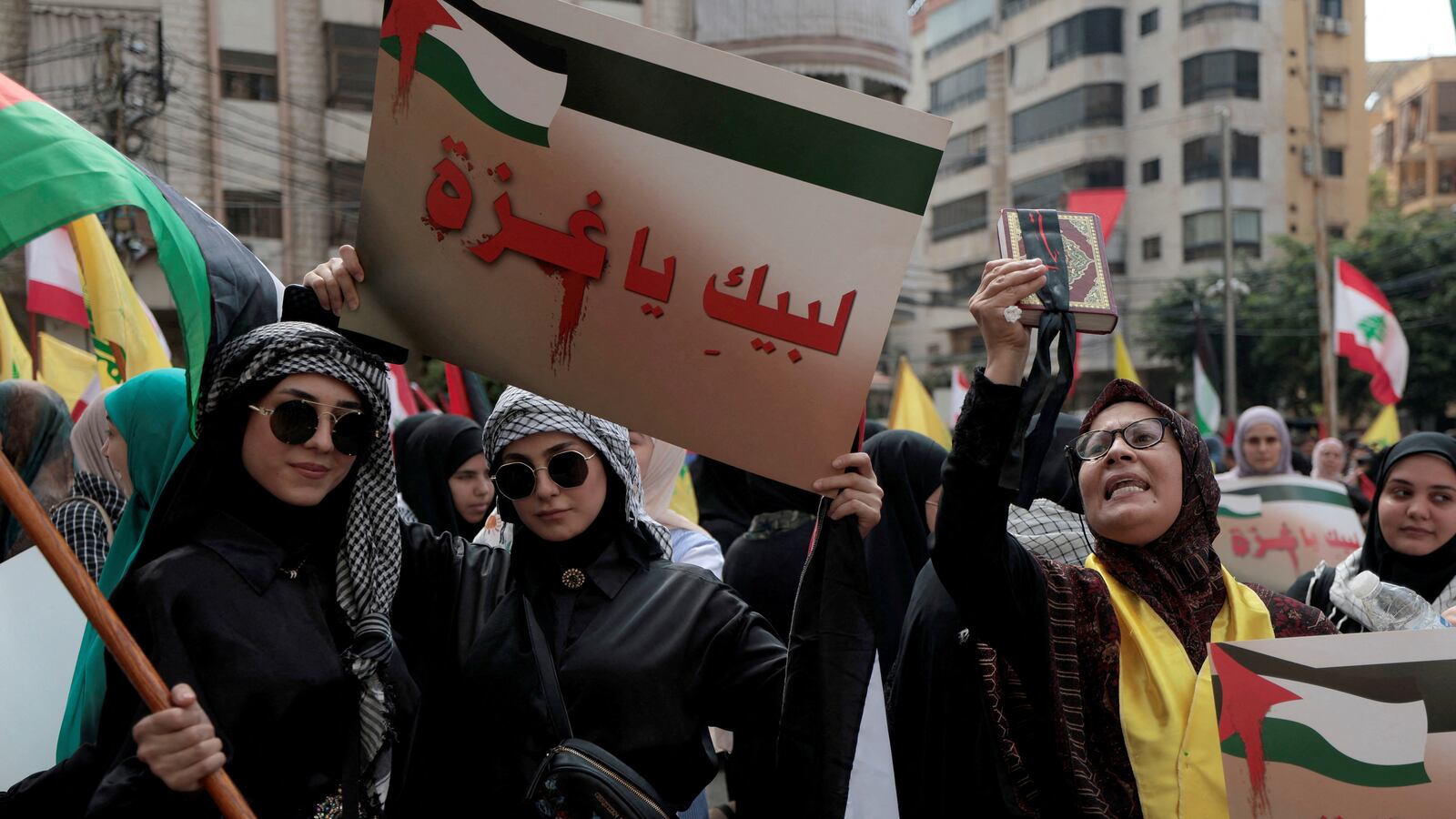 Hezbollah supporters attend a rally supporting Palestinians in Gaza