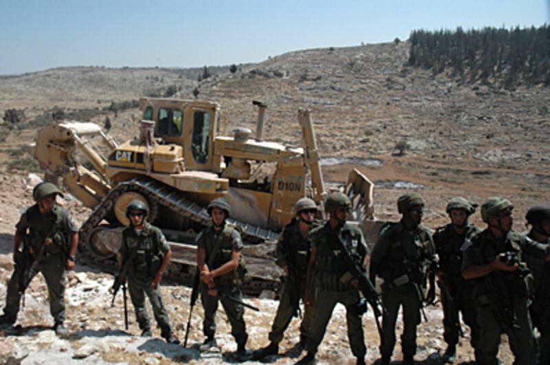 articles/2010/10/22/tearing-down-jerusalems-walls/olopade-budrus_135349_aq0bno