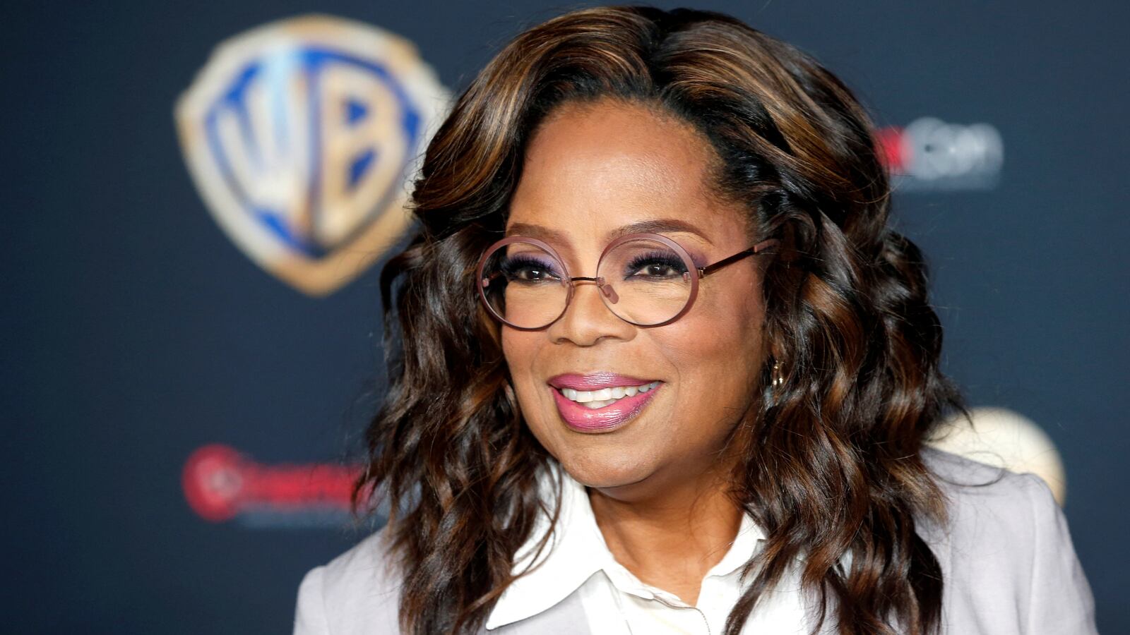 Oprah Winfrey, promoting the movie The Color Purple, attends a Warner Bros. presentation during CinemaCon, the official convention of the National Association of Theatre Owners.