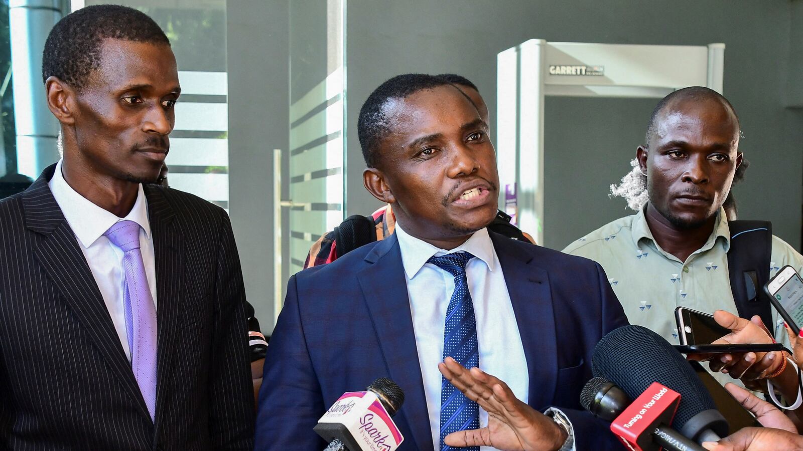 Ugandan human rights lawyers and activists talk to the media after filing a petition challenging the signing of the new anti-homosexuality law by President Yoweri Museveni, at the constitution court in Kampala, Uganda, May 29, 2023.