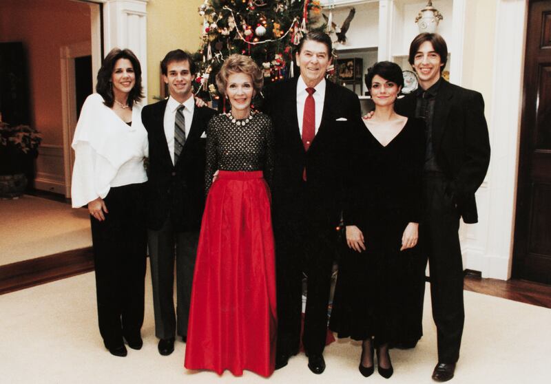 L-R: Daughter Patti Davis, Paul Grilley, First Lady Nancy Reagan, President Ronald Reagan, daughter-in-law Doria, and son Ron.
