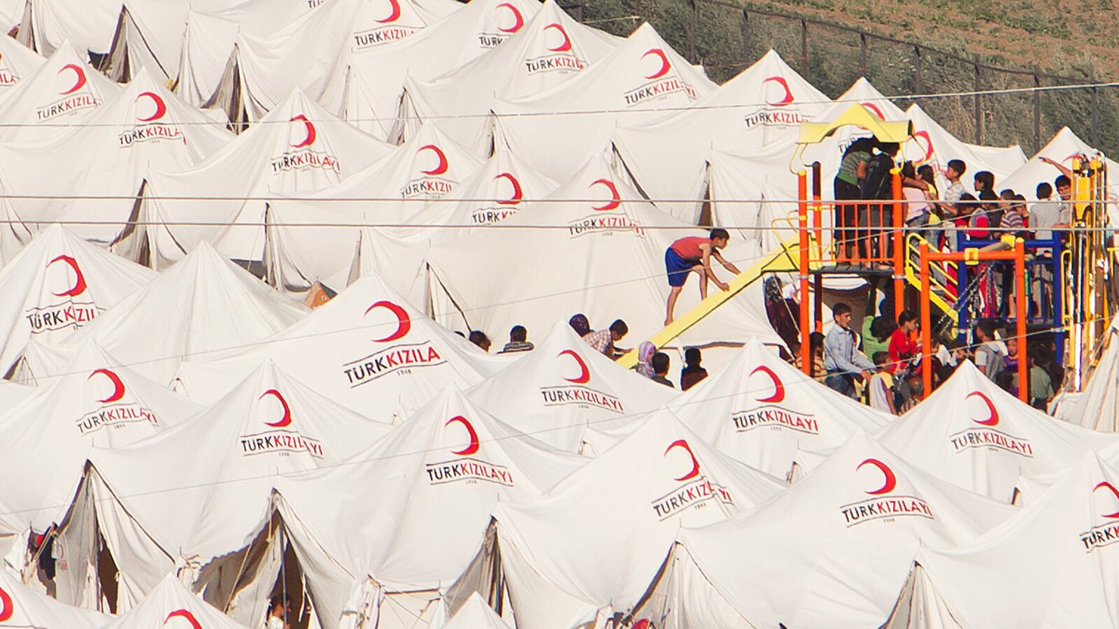 cheats/2011/06/19/turkey-to-aid-fleeing-syrians/turkey-syria-refugees-tents_yt3iqi