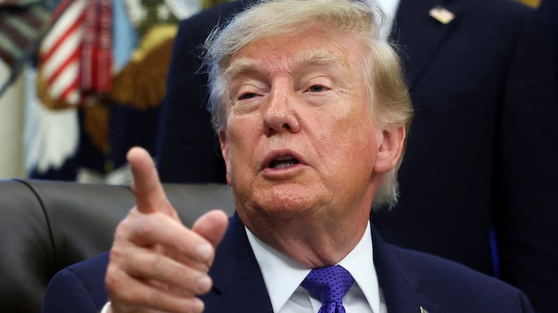 Donald Trump takes questions from the press in the Oval Office early this week.