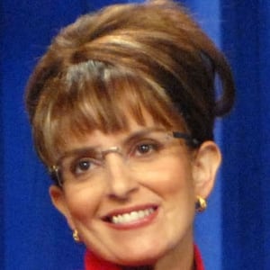 Tina Fey as Sarah Palin and Amy Poehler as Hillary Clinton