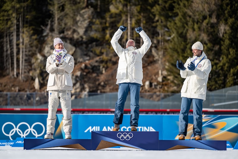 Silver Medalist Eric Perrot of Team France, Gold Medalist Johan-Olav Botn of Team Norway and Bronze Medalist Sturla Holm Laegreid of Team Norway during the medal ceremony