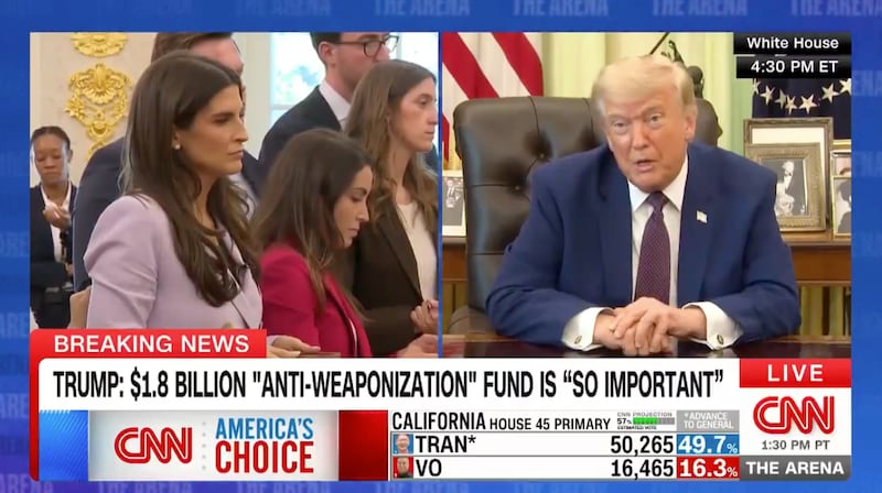 Trump again lashed out at CNN's Kaitlan Collins and told her to smile more.
