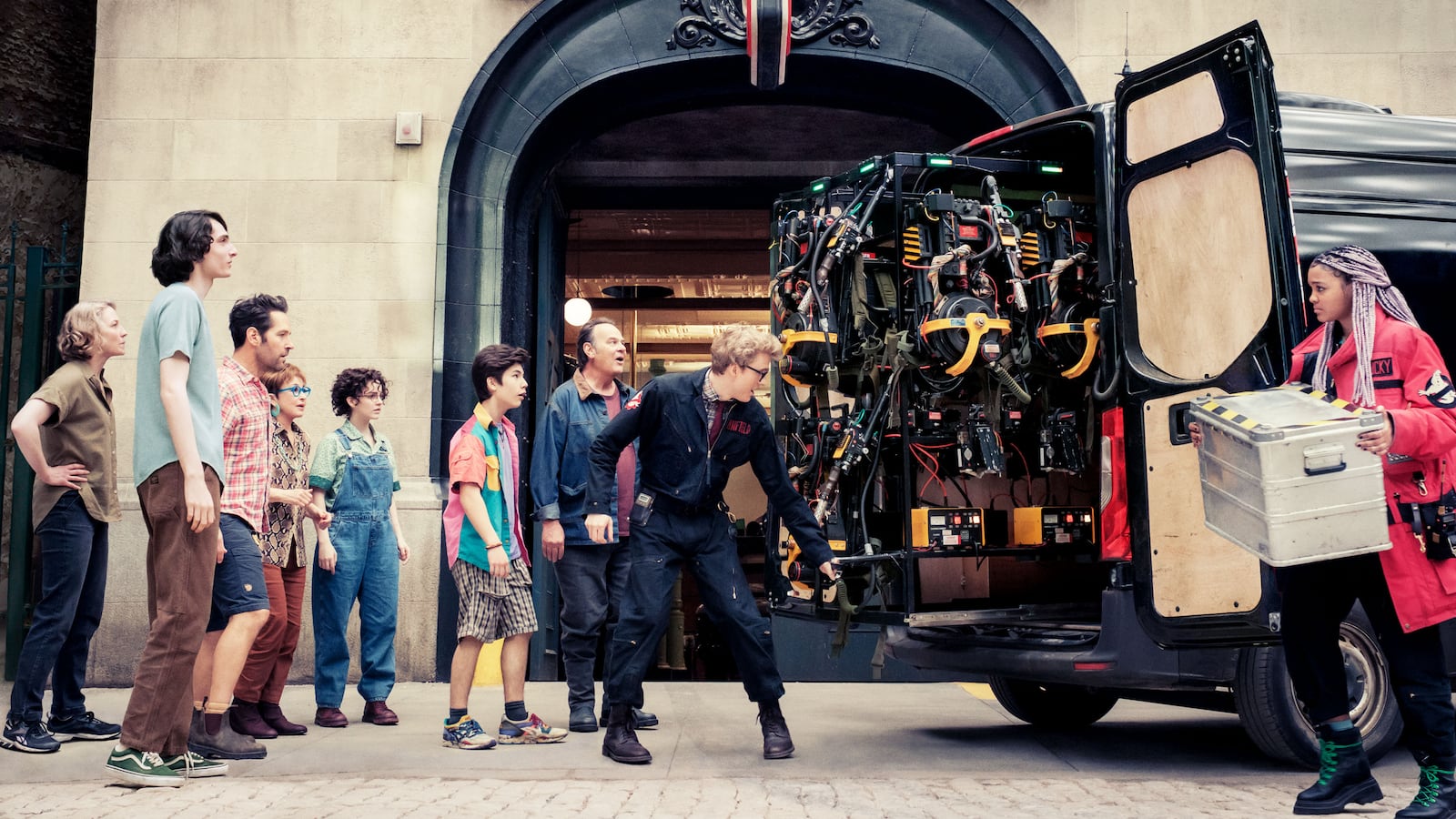 A photo including a still from the film Ghostbusters: Frozen Empire