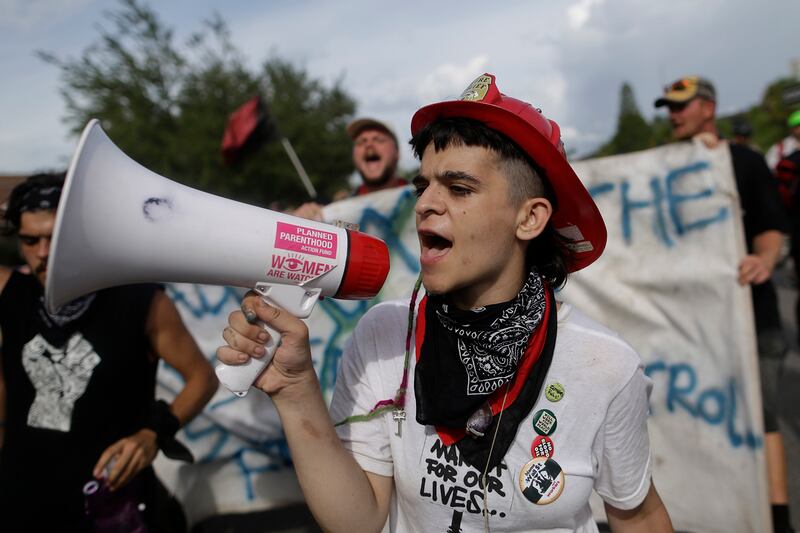 articles/2012/08/29/tampa-protestors-decry-voter-fraud-laws-passed-in-florida-and-other-states/trouble-in-tampa-waddell_omthhz