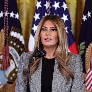 First lady Melania Trump speaks alongside U.S. President Donald Trump during the signing ceremony for the "Fostering the Future" executive order in the East Room of the White House on November 13, 2025 in Washington, DC.