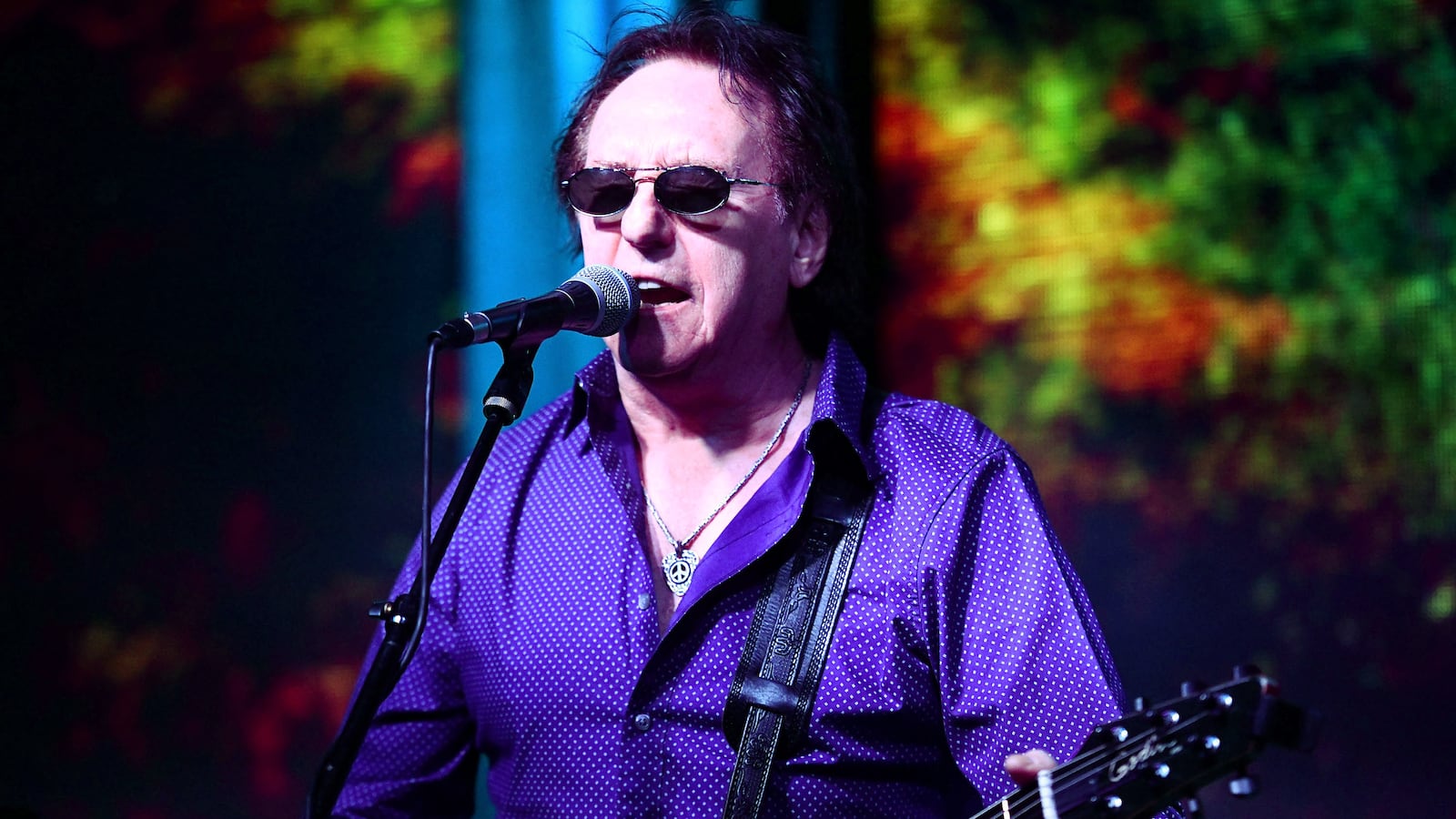 Denny Laine, co founder of the classic rock bands Moody Blues and Wings, performs onstage at Bogies on August 23, 2018