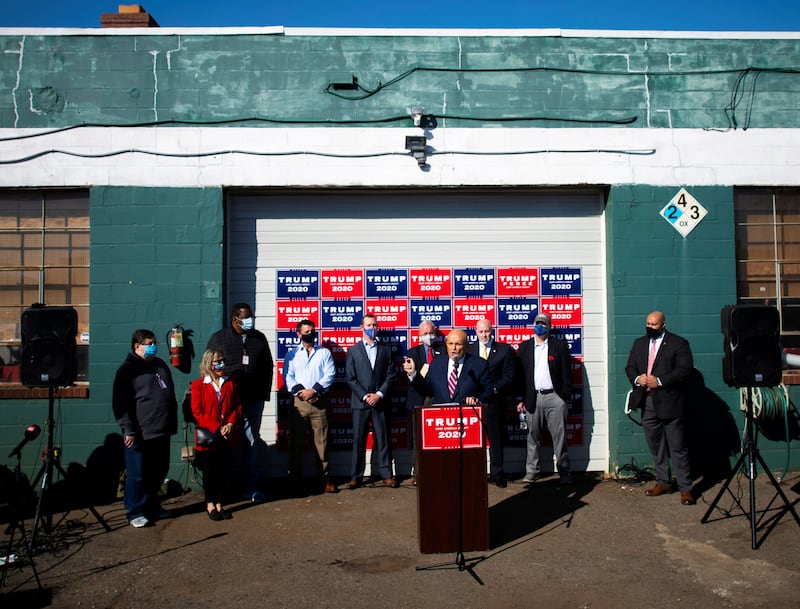 Giuliani outside the Four Seasons Landscaping company in Philadelphia, misinforming the public about the 2020 presidential election