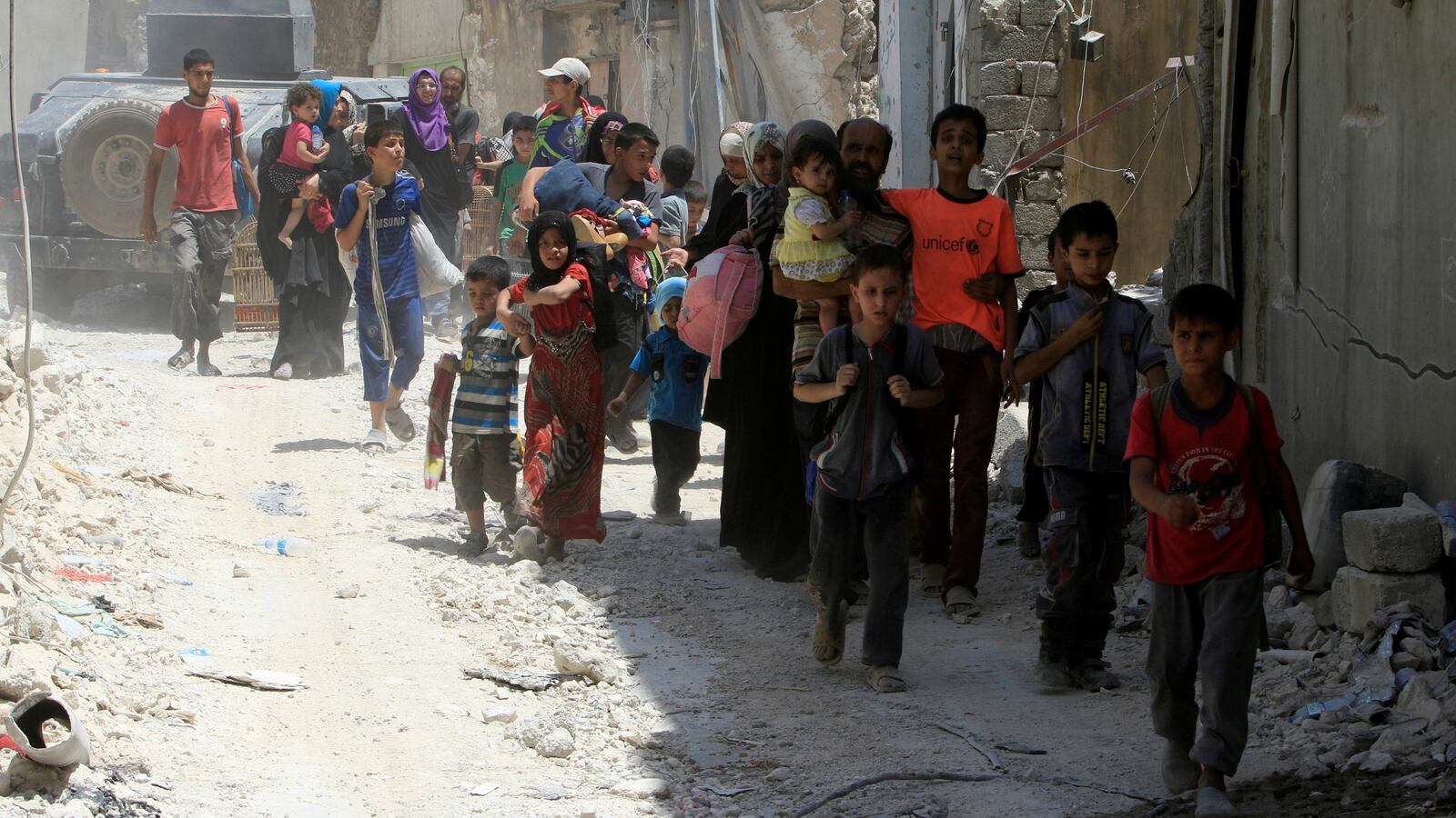 170703-iraq-suicide-bombing-camp-cheat_yx9vq7