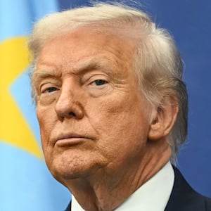 US President Donald Trump attends the signing ceremony of a peace deal with the President of Rwanda Paul Kagame and the President of the Democratic Republic of the Congo Felix Tshisekedi