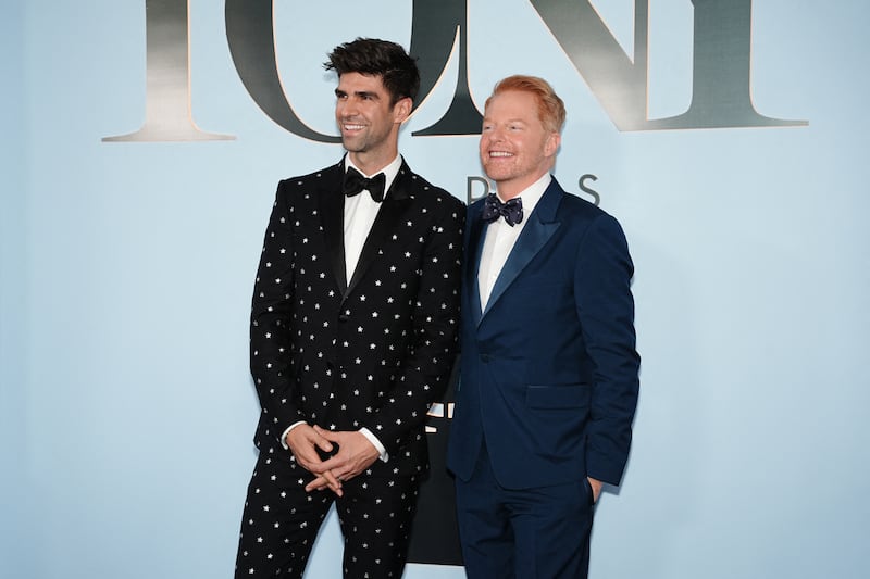 Justin Mikita and Jesse Tyler Ferguson pose during the 79th Annual Tony Awards in New York City, U.S., June 7, 2026. REUTERS/Angelina Katsanis