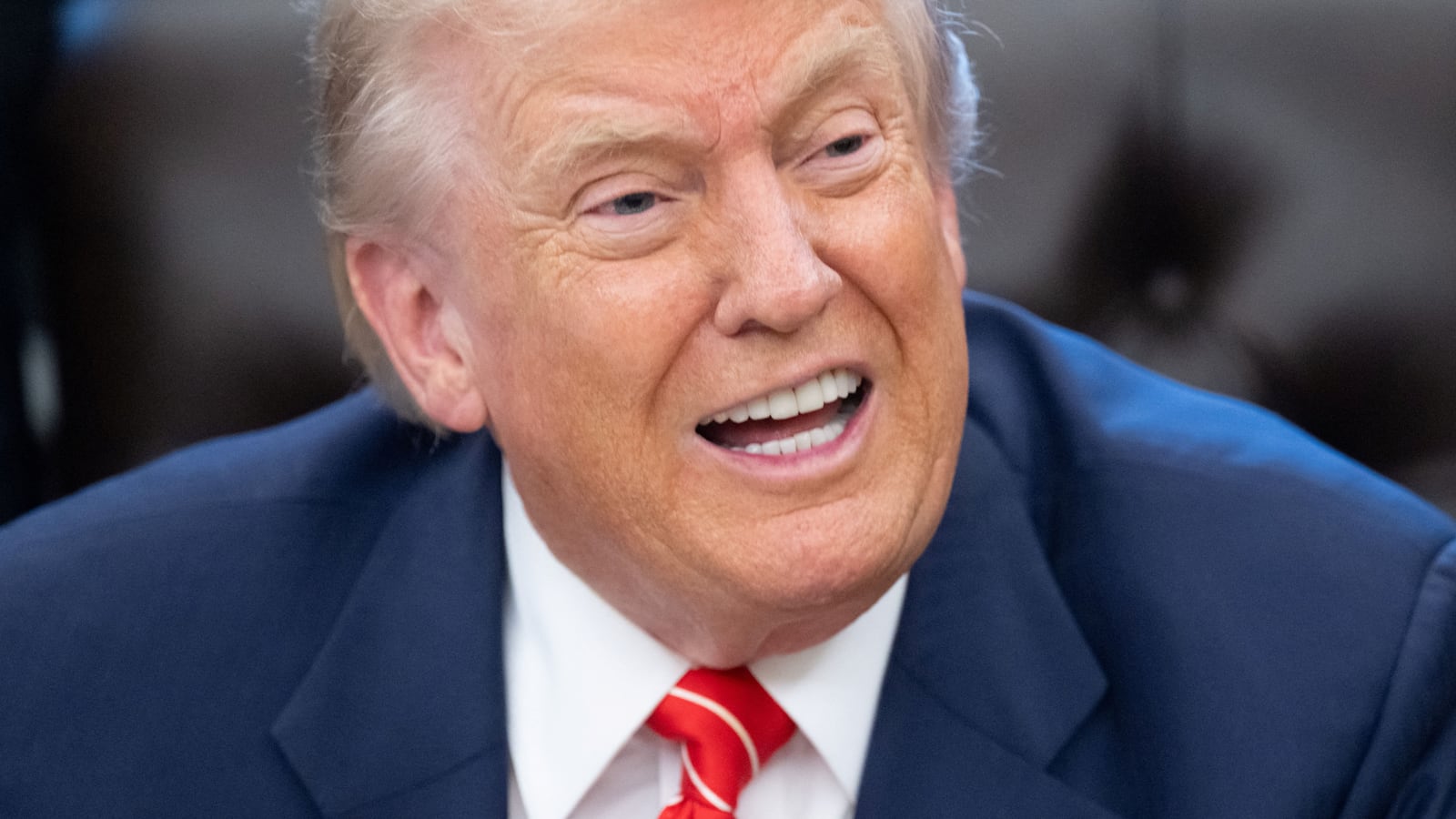 US President Donald Trump speaks with the media after signing a funding bill to end a partial government shutdown in the Oval Office of the White House in Washington, DC, February 3, 2026. The US House of Representatives passed a spending bill on Tuesday ending the four-day partial government shutdown sparked by Democratic opposition to funding for the federal agency carrying out President Donald Trump's immigration crackdown. (Photo by SAUL LOEB / AFP via Getty Images)