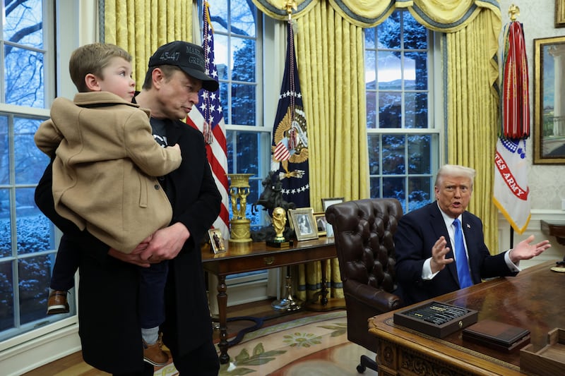 Musk with his son, X Æ A-12, in the Oval Office last February. Musk would leave his temporary role in DOGE in May.