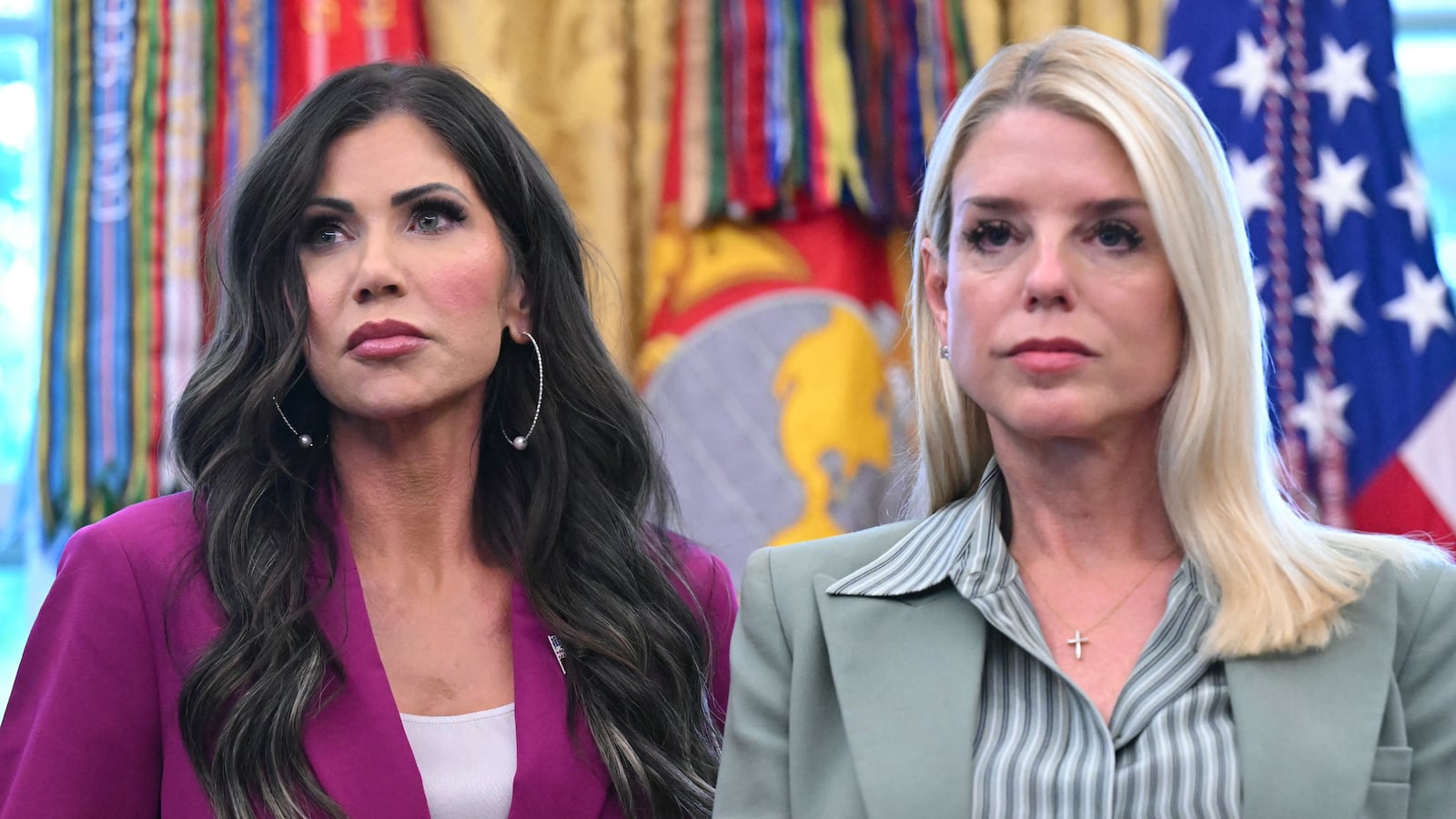 US Secretary of Homeland Security Kristi Noem (L) and US Attorney General Pam Bondi (R)