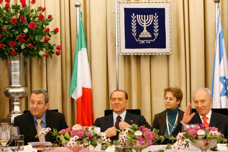 articles/2013/11/06/why-do-italian-jews-tolerate-berlusconi-s-trivialization-of-the-holocaust/OZ_Berlusconi_in_Israel_mveiwb