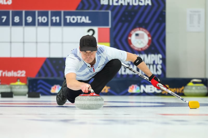 Rich Ruohonen of the United States throws during the Mixed Doubles Olympic Trials final at Curl Mesabi Curling Club on October 31, 2021 in Eveleth, Minnesota.