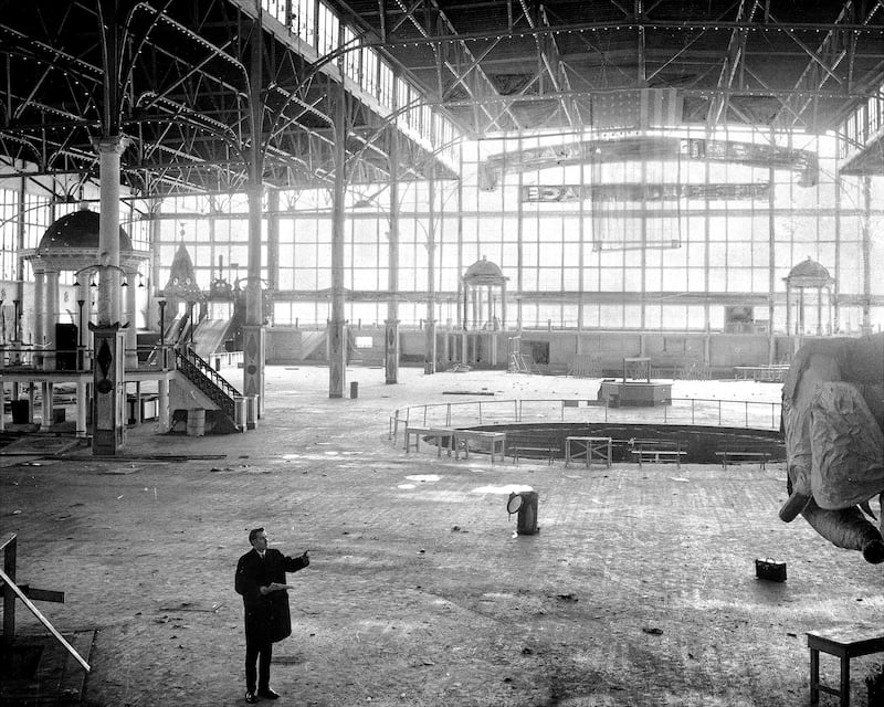 Fred Trump Jr. is the lone occupant in this empty of nearly everything but memories is the shell of the main building once world famous Steeplechase Park. The gaily painted wooden horses that once were a main attraction in the 12-acre amusement complex build in 1897 by George C. Tilyou are gone and sold to a British amusement firm. Coney Island Chamber of Commerce has suggested city operated seaside park and bathing pavilion as a replacement for the old amusement center. Part of site would become 1,000 car parknig field. (Photo by Leroy Jakob/NY Daily News Archive via Getty Images)
