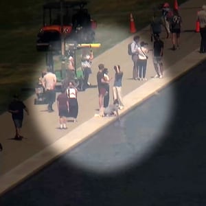 The US Park Police are looking for a woman seen reaching into the reflecting pool.