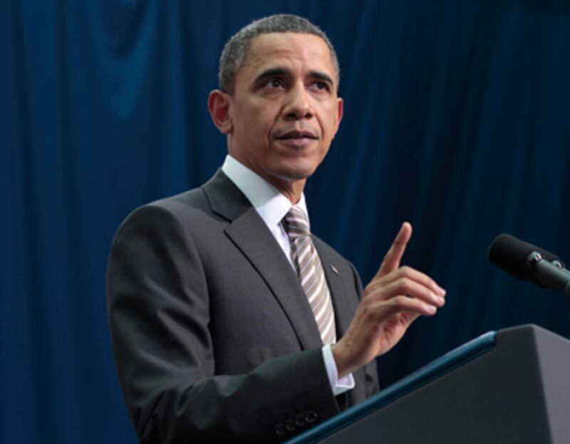 articles/2011/03/28/libya-war-gaddafi-listen-to-obama/stone-obama-gaddafi_169798_o1plff