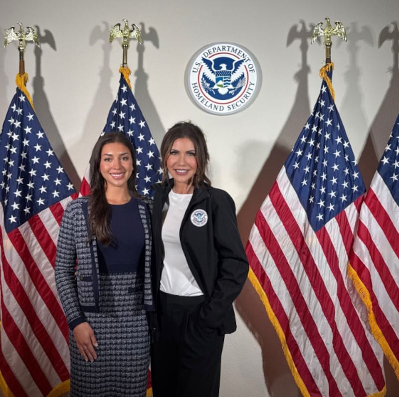 Julia Varvaro posed for a photo alongside ousted Homeland Security Secretary Kristi Noem.