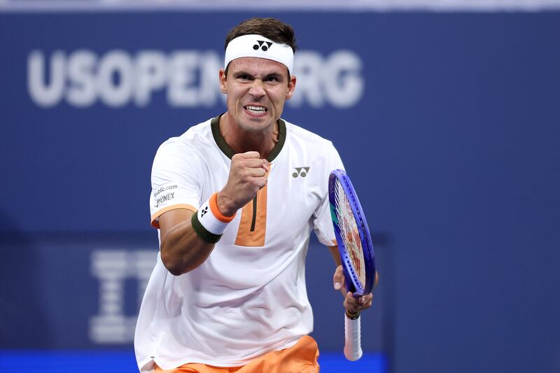 NEW YORK, NEW YORK - AUGUST 28: Daniel Altmaier of Germany reacts against Stefanos Tsitsipas of Greece against during their Men's Singles Second Round match on Day Five of the 2025 US Open at USTA Billie Jean King National Tennis Center on August 28, 2025 in the Flushing neighborhood of the Queens borough of New York City. (Photo by Mike Stobe/Getty Images)