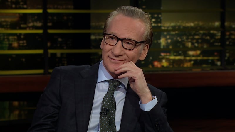 Real Time host Bill Maher sits on set of his HBO tv show.