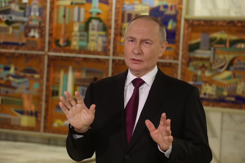 Vladimir Putin speaks to journalists ahead of his meeting with U.S. officials on Tuesday.
