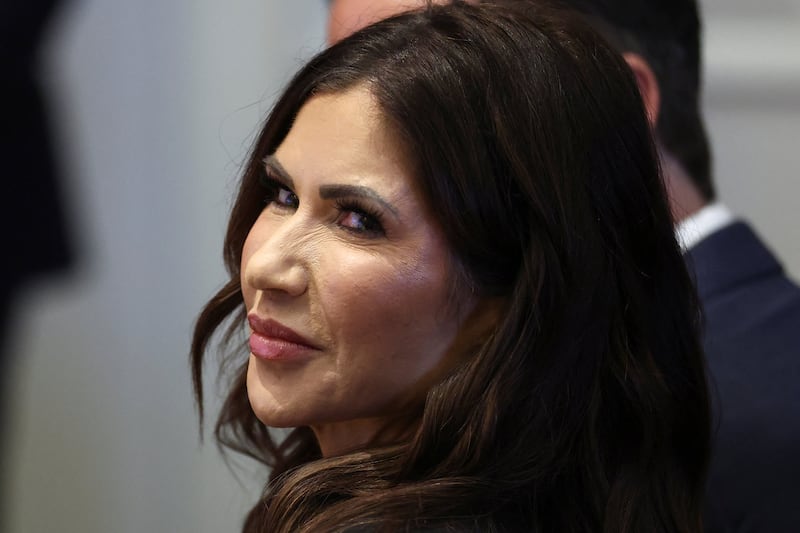 Kristi Noem reacts as she attends the "Shield of the Americas" Summit in Miami, Florida, U.S., March 7, 2026.