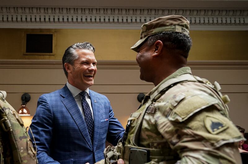 WASHINGTON, DC - AUGUST 20:  Defense Secretary Pete Hegseth greets members of the National Guard during a visit to Union Station on August 20, 2025 in Washington, D.C. The Trump administration has deployed federal officers and the National Guard to the District in order to place the DC Metropolitan Police Department under federal control and assist in crime prevention in the nation's capital. (Photo by Al Drago-Pool/Getty Images)