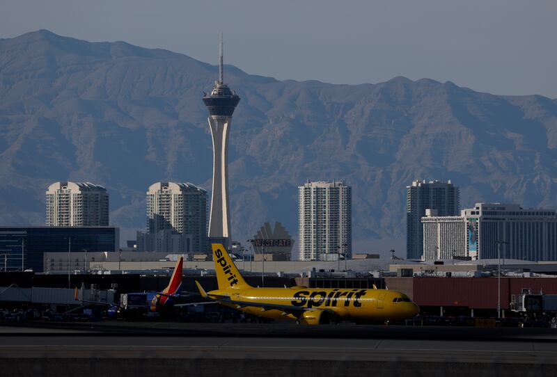 LAS VEGAS, NEVADA - AUGUST 07: A Spirit Airlines plane taxis at Harry Reid International Airport on August 07, 2025 in Las Vegas, Nevada. Las Vegas has seen a drastic 7 percent decrease in tourism since the start of the year, largely due to rising travel costs and a Canadian boycott of travel to the United States, stemming from political tensions. Unemployment in the city surged to 5.8 percent in June, the third-highest among major U.S. metropolitan areas with populations exceeding one million. Las Vegas real estate is also taking a huge hit with an over 10 percent decline in year-over-year sales, and inventory has skyrocketed by 44.8 percent. (Photo by Justin Sullivan/Getty Images)