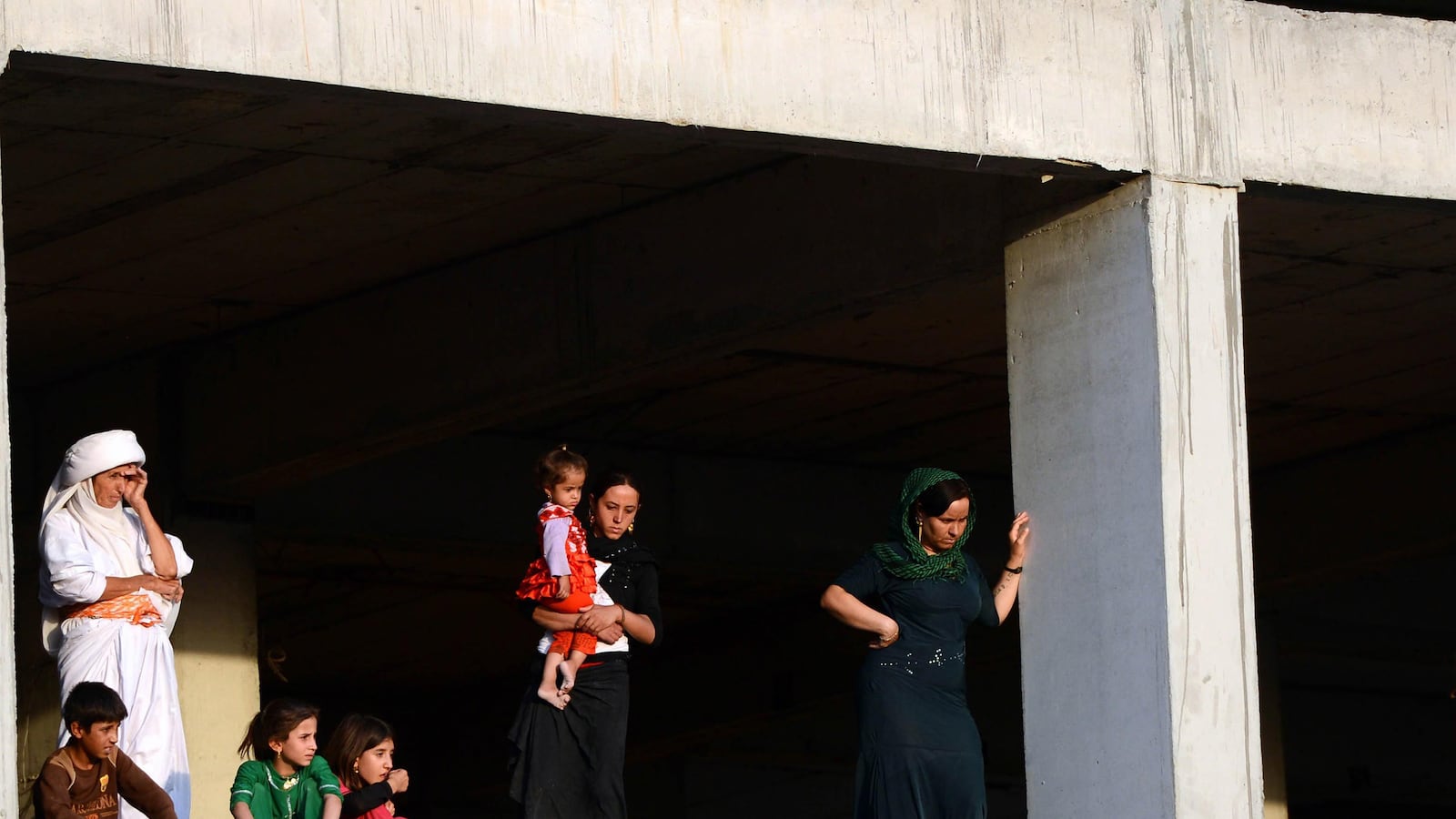 articles/2014/08/19/hanifa-s-story-five-sisters-taken-by-isis-to-be-sold-or-worse/140818-van-den-Toorn-isis-sisters-tease_qobkww