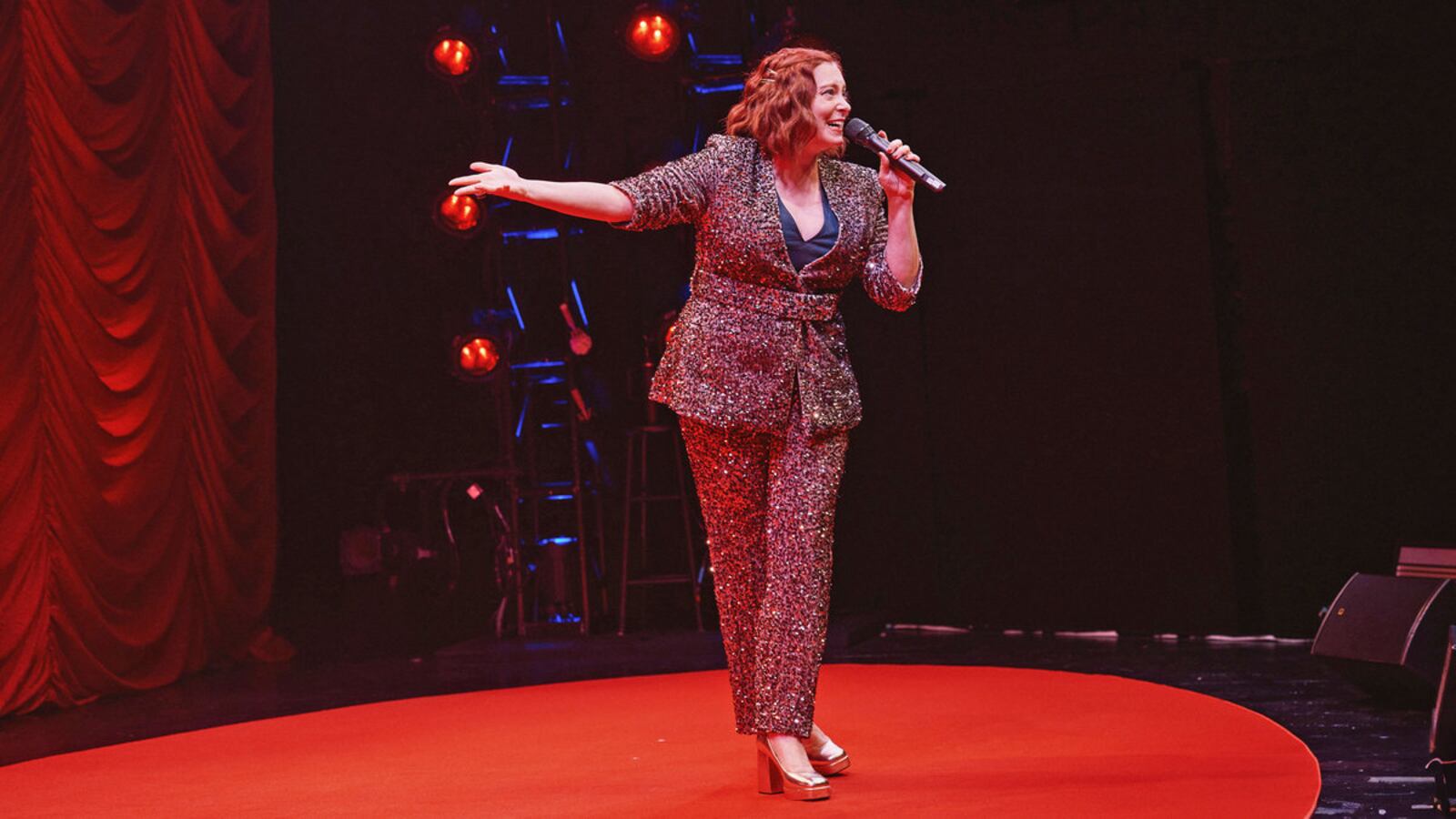 Rachel Bloom on stage at her show “Death, Let Me Do My Show”