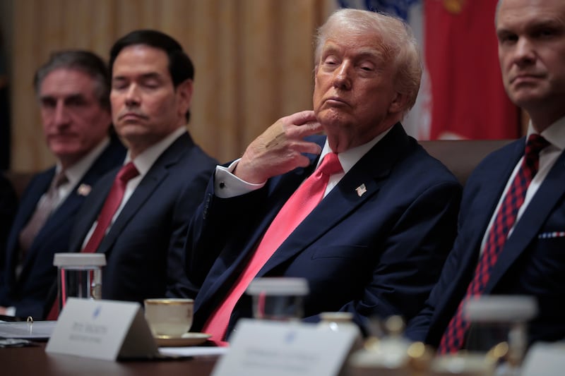 U.S. President Donald Trump wears adhesive bandages on the back of his hand during a meeting of his cabinet in the Cabinet Room of the White House on December 02, 2025 in Washington, DC.