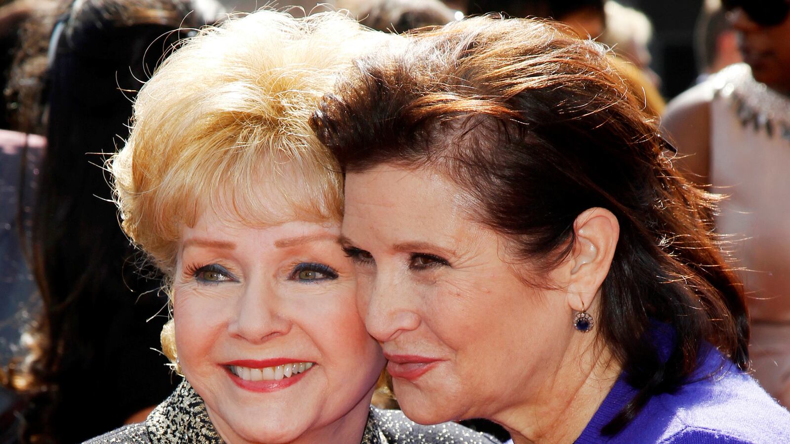 articles/2016/12/29/did-carrie-fisher-s-death-lead-debbie-reynolds-to-die-of-a-broken-heart/161229-crocker-broken-heart-death-tease_mmia9k