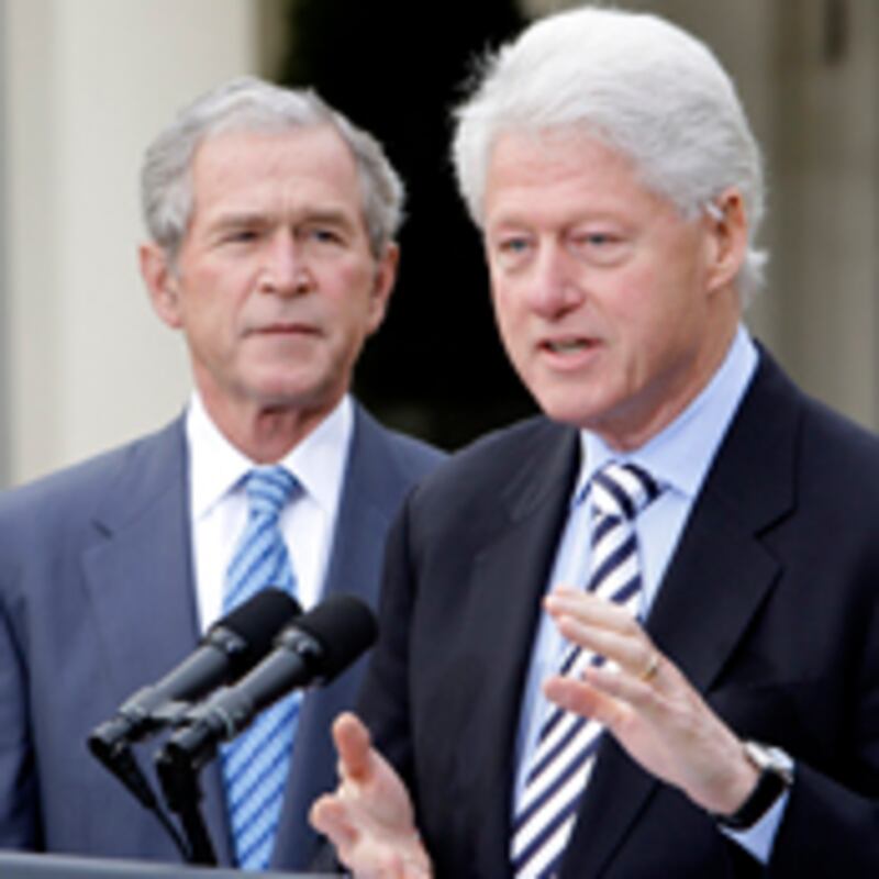 articles/2010/01/18/the-cynical-bush-clinton-show/haiti-bush-clinton_76067_bxcgxl