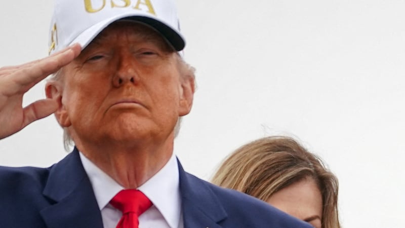 U.S. Special Envoy Steve Witkoff stands behind President Donald Trump and first lady Melania Trump during the transfer of the remains of six U.S. Army service members who were killed in Kuwait.