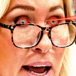 Marjorie Taylor Greene shooting lasers from her eyes to Mike Johnson