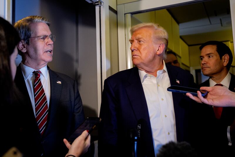 IN FLIGHT - OCTOBER 27: U.S. Treasury Secretary Scott Bessent (L), accompanied by U.S. President Donald Trump and U.S. Secretary of State Marco Rubio (R), speaks to members of the media aboard Air Force One on October 27, 2025, in flight. Trump is in route to Japan after attending the Association of Southeast Asian Nations (ASEAN) summit in Malaysia, and will travel on to South Korea for the Asia-Pacific Economic Cooperation (APEC) forum. (Photo by Andrew Harnik/Getty Images)