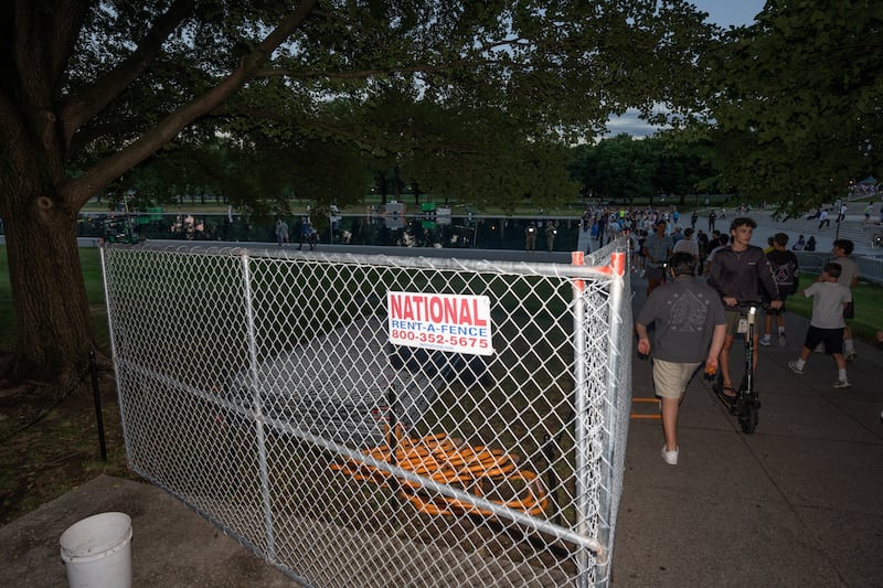 Fencing near the Lincoln Memorial Reflecting Pool, after recent renovations following a directive from U.S. President Donald Trump to paint it blue ahead of the 250th anniversary of U.S. Independence, in Washington, D.C., U.S., June 23, 2026.