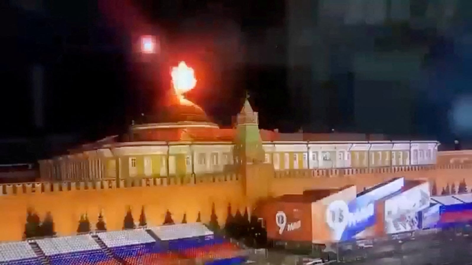 A still image taken from video shows a flying object exploding in an intense burst of light near the dome of the Kremlin Senate in Moscow, Russia, in this image taken from video obtained by Reuters May 3, 2023.