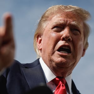 U.S. President Donald Trump gestures as he speaks to the media before boarding Air Force One at Joint Base Andrews in Maryland, U.S., en route to Myrtle Beach, South Carolina, August 21, 2026. REUTERS/Evan Vucci