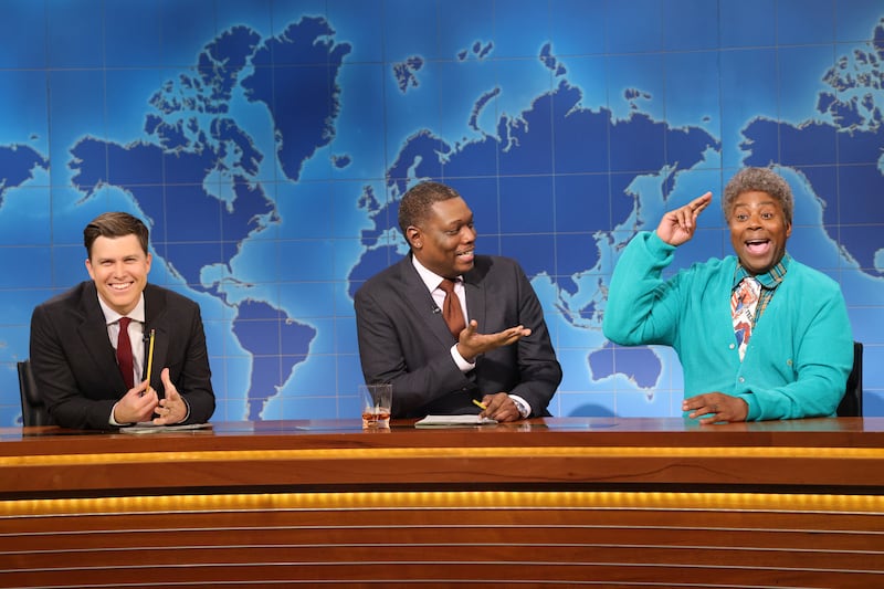 Anchor Colin Jost, anchor Michael Che, and Kenan Thompson as Willie during Weekend Update