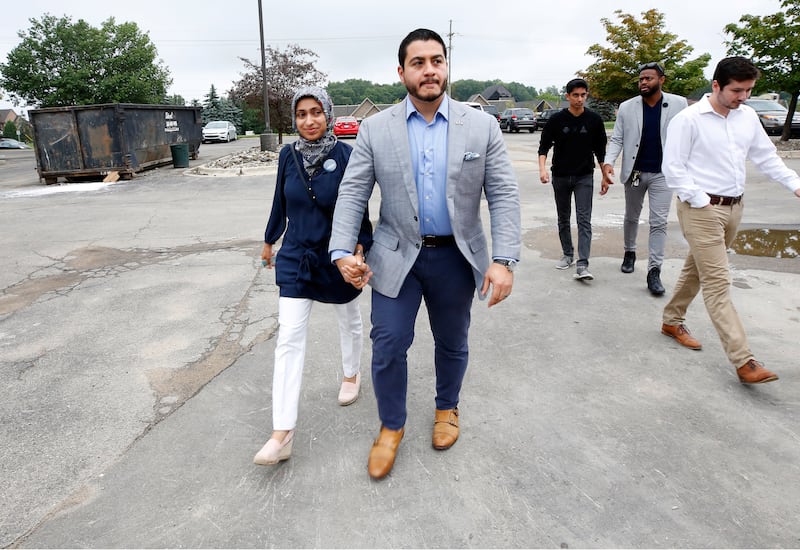 Democratic Governor candidate Abdul El-Sayed arrives to vote with his wife Sarah Jukaku at Lakeside Assembly of God for the Michigan Primary Election in Shelby,