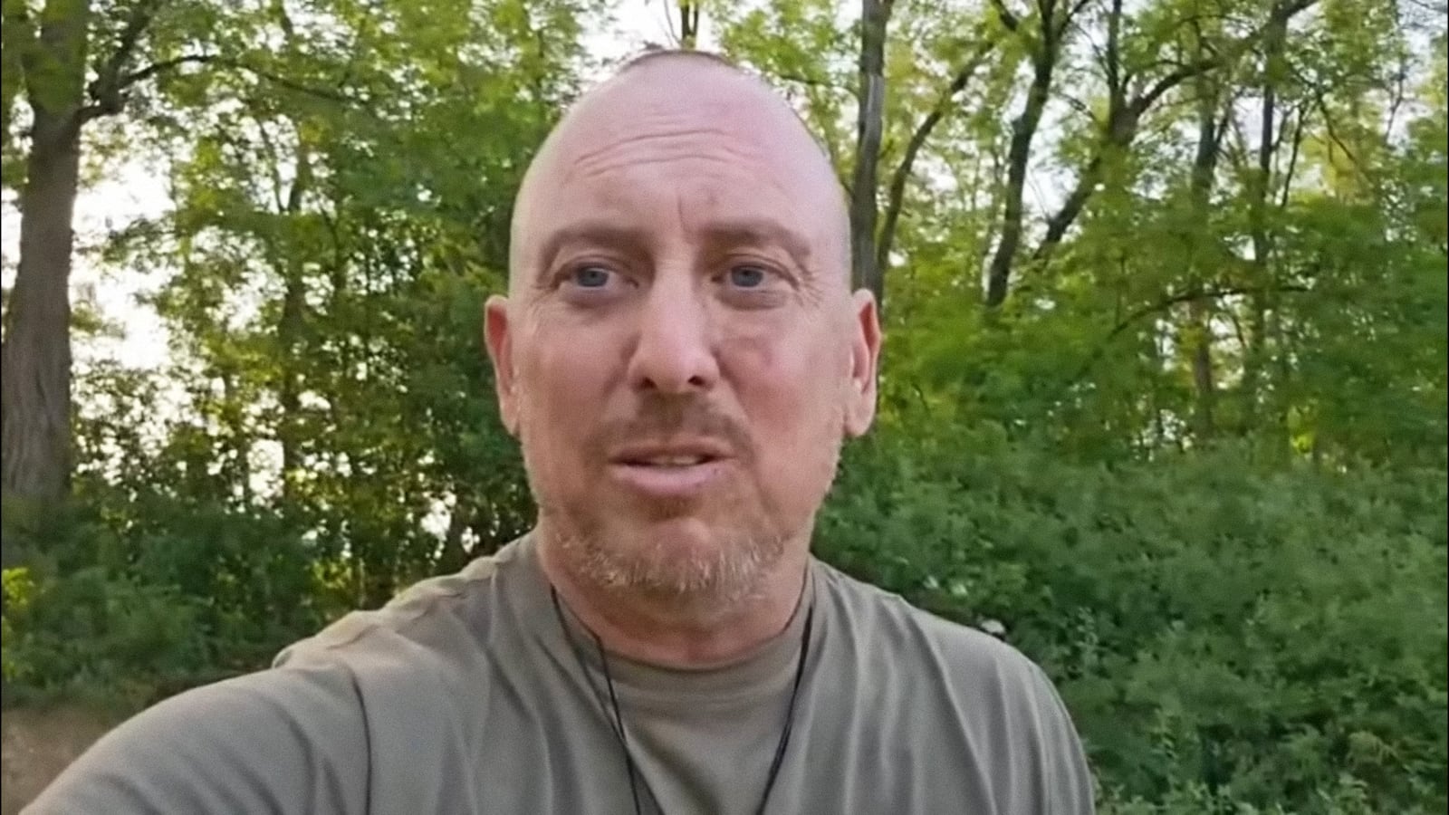 Derek Huffman, 45, of Texas, records a video during training after joining the Russian military.