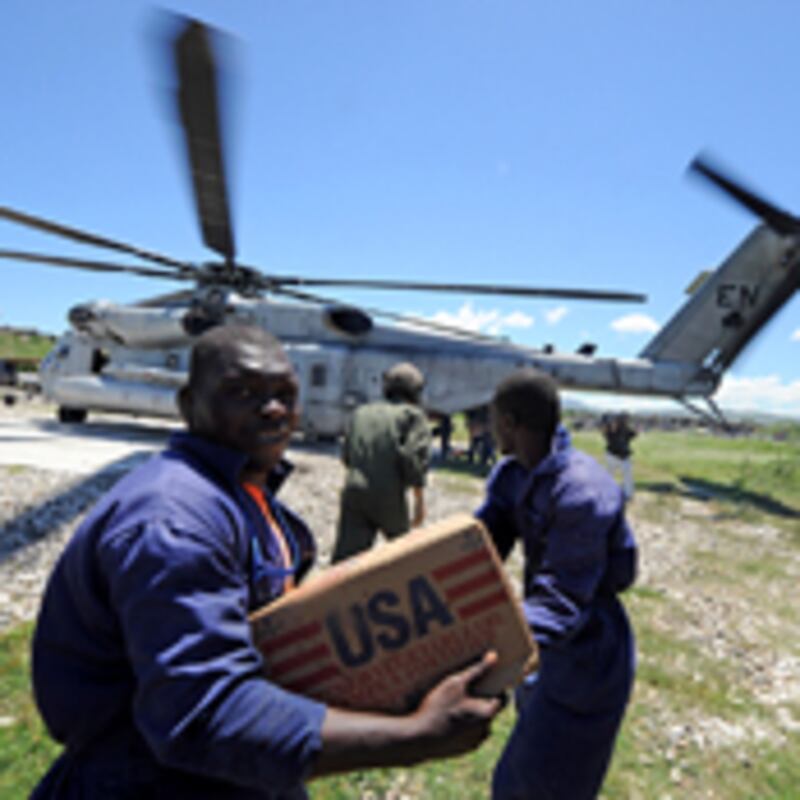 articles/2010/01/14/the-military-moves-in/allard-haiti-military-relief_75412_n1rvl1