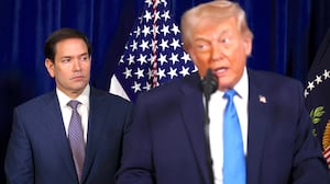 U.S. Secretary of State Marco Rubio listens as U.S. President Donald Trump addresses the media during a news conference at his Mar-a-Lago club on January 03, 2026, in Palm Beach, Florida.