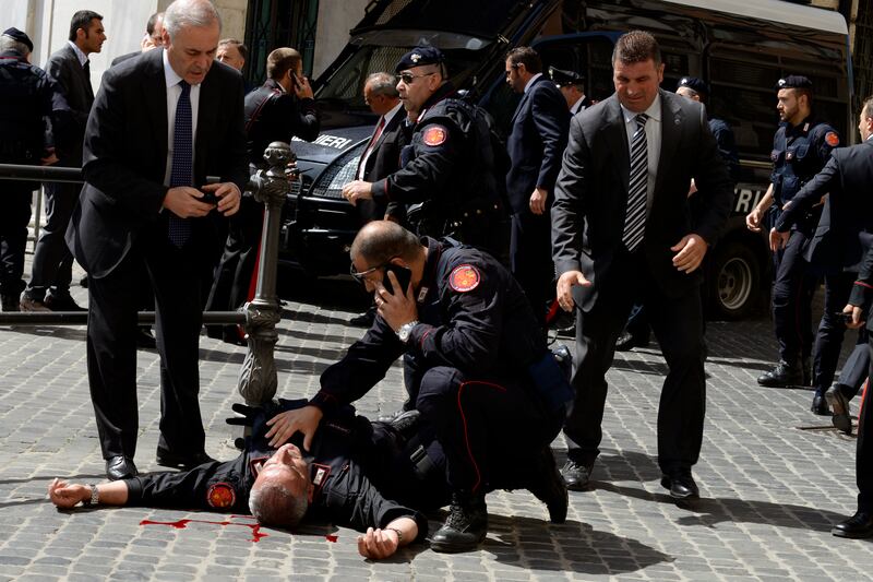articles/2013/04/28/two-police-shot-outside-pm-s-office-as-new-italian-government-sworn-in/130428-rome-shooting-nadeau-tease_vnih22